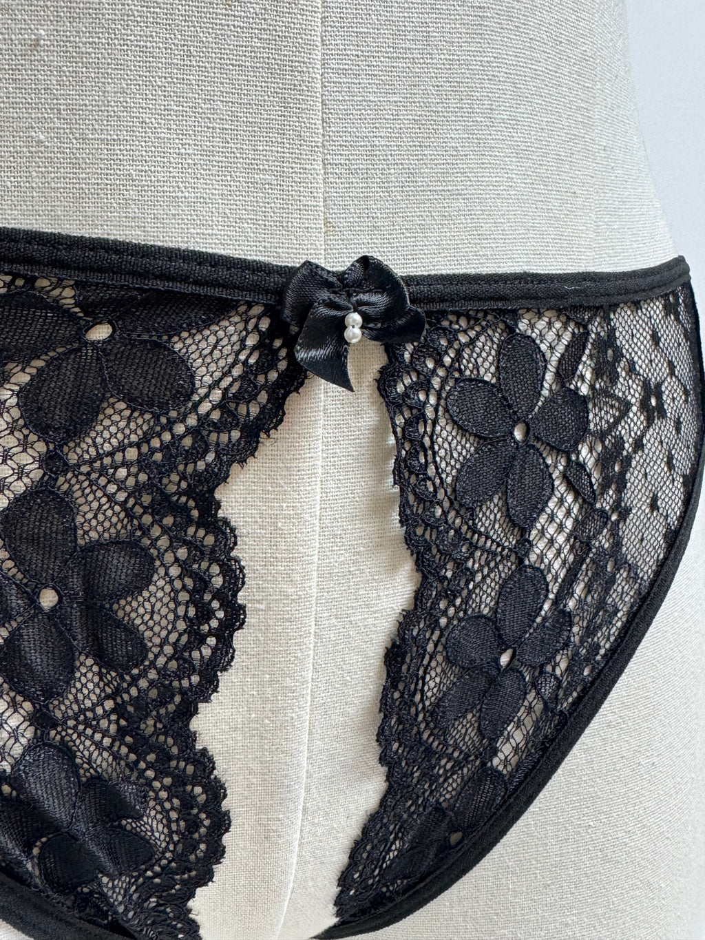 Close-up detail of Romantic High Waist Crotchless Lace Panty with Bow Detail by Wela Wela – front view in Australia